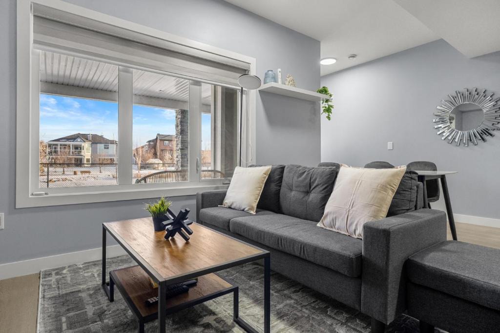 Airdrie Apartment | 1BR Entertainment Space Projector and Games Room