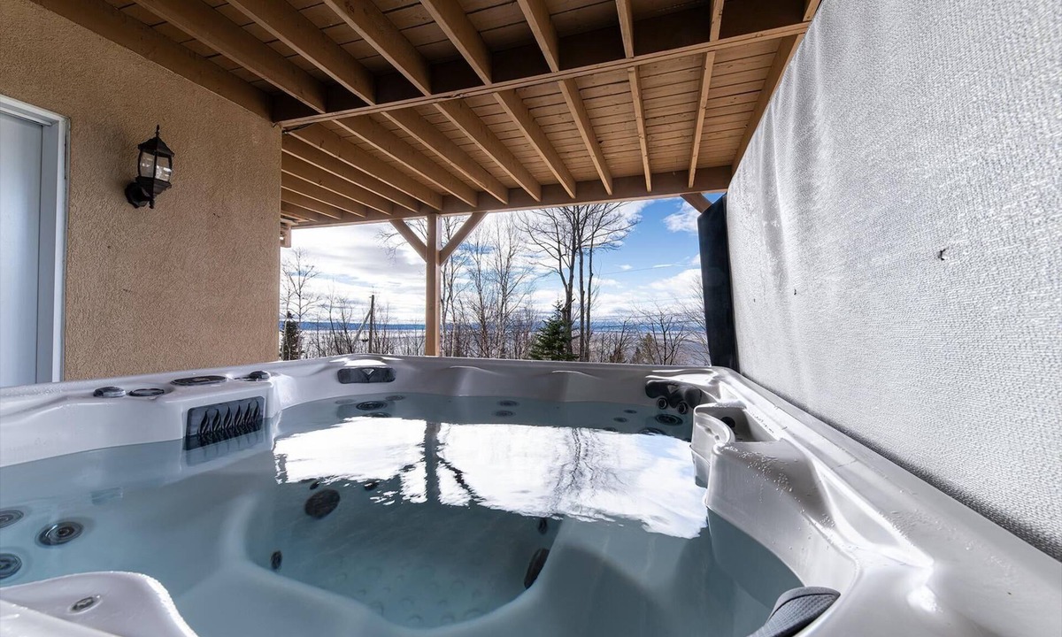 Petite-Riviere-Saint-Francois Apartment | Condo 120B: Hot Tub, Panoramic Views & Game Area