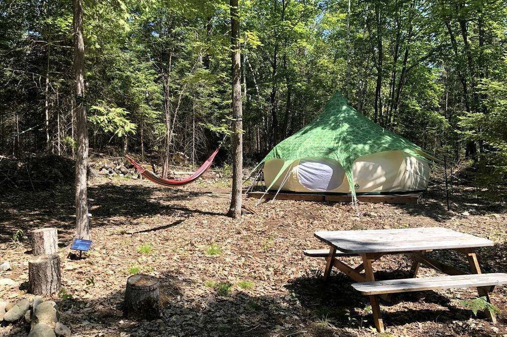 Manitoulin District RV Rental | Cozy Off-Grid Canvas Bell Tent Surrounded by Nature for a Peaceful Getaway in Tehkummah, Ontario
