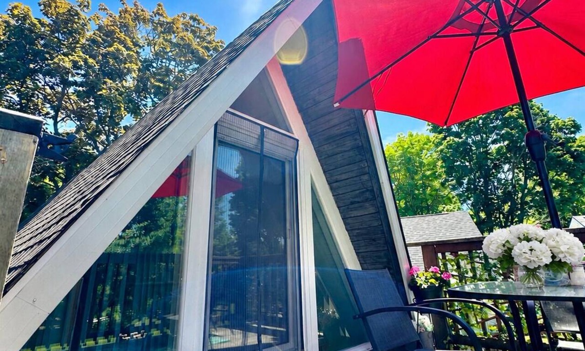 Plympton-Wyoming Cottage | Cozy Riverfront A-Frame. Paddle from the Backyard or Walk in mins to Lake Huron