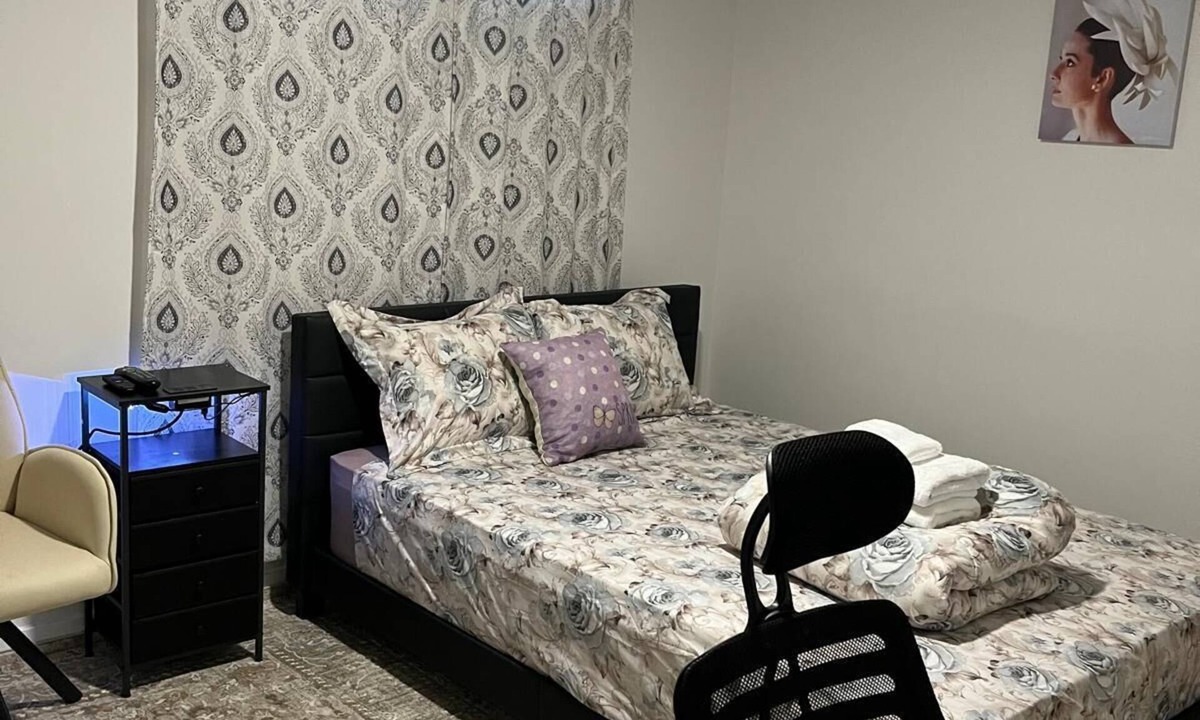 Chestermere House | Homely Comfort Room. Shared washroom with One