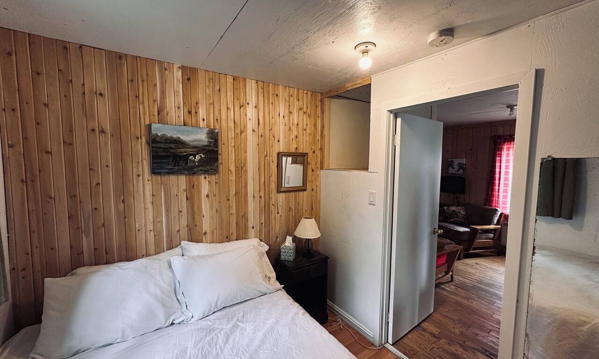 La Malbaie Cabin | Horse shelter. Located on a ranch with a view of the horses. Pets allowed.