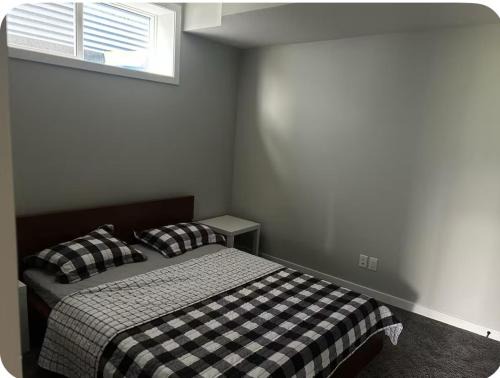 Airdrie House | Pond view Walkout