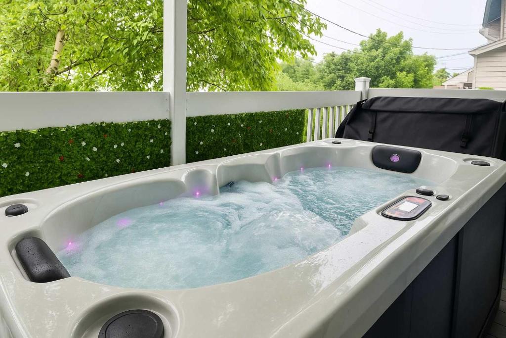Quartier 5-4 Apartment | The Coziest - Hot Tub - EV Chrger & Free Parking