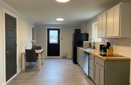 St. John's Apartment | 1 BRM suite w/kitchenette + hot tub + air conditioning- free off street parking