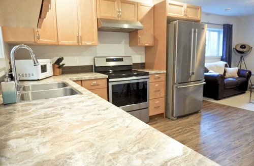 Okanagan-Similkameen Apartment | 1 King bed, suite by the Beach, Casino, Arena, with bike storage!