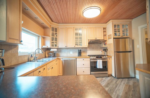 Sylvan Lake House | 11 person hot tub, A/C, Fire Pit, Arcade. 5 minutes from the water.