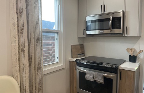Woodbine Heights House | 1BR Main Floor Toronto | 15 Min Downtown + Parking