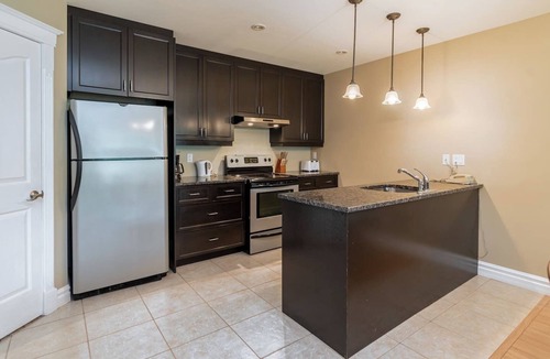 Beaupre Condo | 2-bedroom condo with water park, spa and gym!