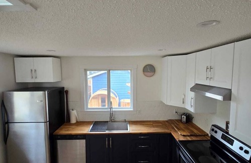 Southeast Calgary House | A Little R & R- private sauna & hot tub