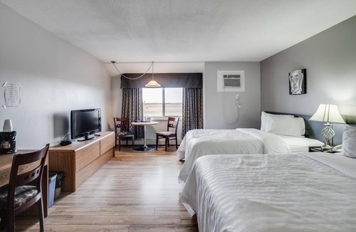 Martensville Hotel | Adobe Inn