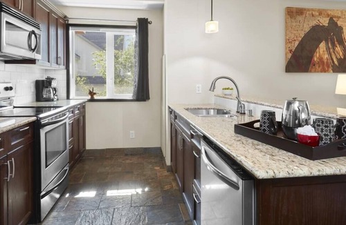 Canmore Condo | Beautiful 2 Bed 2 bath Pool Waterslide & Hot tubs