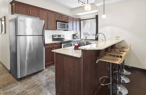 Canmore Condo | Beautiful 2 Bed 2 bath Pool Waterslide & Hot tubs