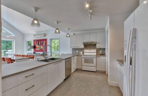 Mille-Isles Ski Chalet | Beautiful waterfront cottage on a pristine lake in Morin Heights