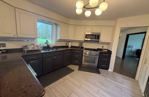 Bayfield House | Bluewater Lakehouse Retreat with Private Beach & Hot Tub