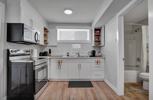 Saskatoon House | Brand New 2BR Suite close to Airport with Parking