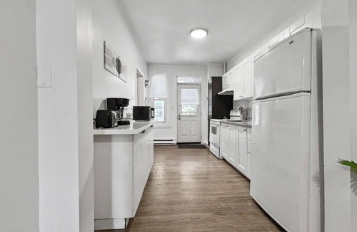 Maisonneuve Apartment | Bright 2BR near Stadium + Private Garden