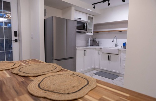 Woodbine - Lumsden Apartment | Bright & Stylish Renovated Basement close to Downtown