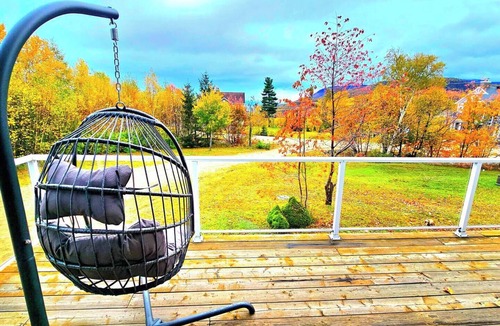 Petite-Riviere-Saint-Francois Condo | 3 BDRM - WoW: Spa, river view, fireplace & more!