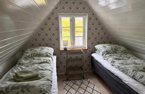 Sandavagur House | Cabin by Gáansá