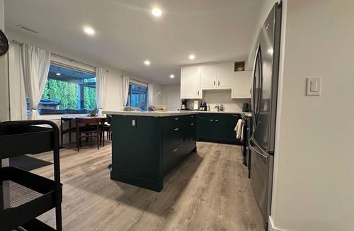 BX House | Charming 2-bedroom walk-out basement in tranquil Coldstream with swim spa