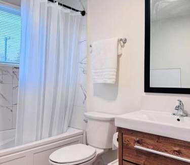 West Side House | Charming Queen Bedroom with Bathroom Vancouver West