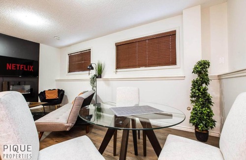 Jasper Place Apartment | Chic Modern Vibes - KING Bed - Fireplace - Sleeps 4 - Wifi