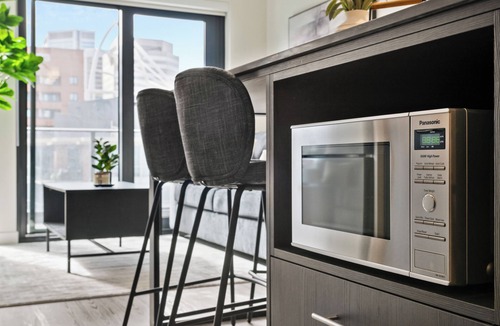 Eau Claire Apartment | City Lights & River Sights 2BR, AC, XL Patio