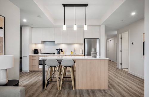 Eau Claire Apartment | City Sophistication w 2 BR River View, Parking, Office