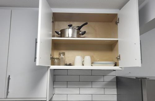 Regina House | Comfortable Two Bed Basement With Free WiFi, Laundry and Private Entry