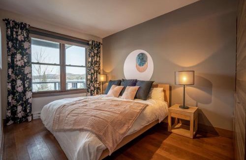 Lac Superieur Village House | Condo overlooking Lac Superieur & mountain views