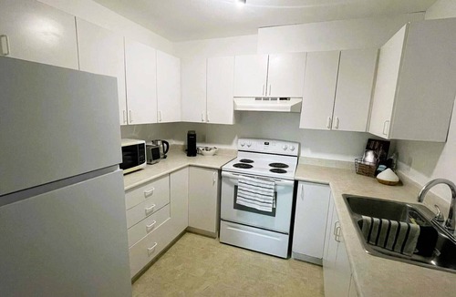 Grande Prairie Condo | Cozy Condo-Your Home Away from Home, 2BR (1KB-1QB) Parking in front of the door!