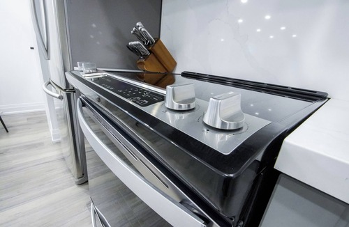 Brantford House | Cozy Hideaway - Private Lower Suite · 2BR · 2BA · Fireplace + Full Kitchen