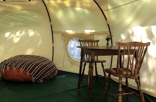 Manitoulin District RV Rental | Cozy Off-Grid Canvas Bell Tent Surrounded by Nature for a Peaceful Getaway in Tehkummah, Ontario