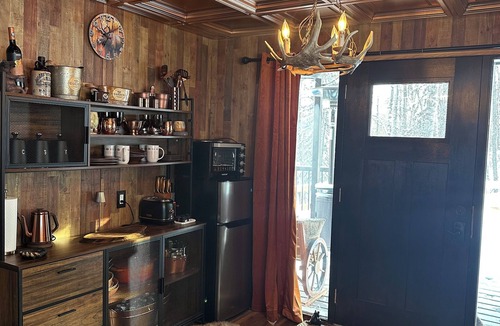 Northern Alberta Cabin | Cozy, secluded cabin with stunning private garden and large covered deck.