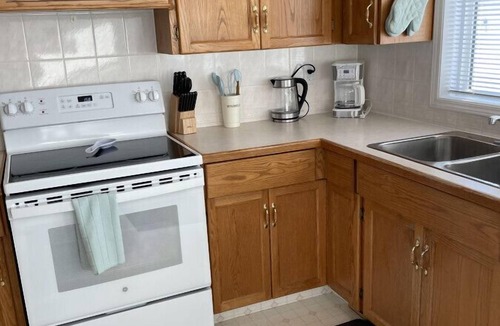 Camrose House | Cozy three bedroom home Cozy three bedroom home