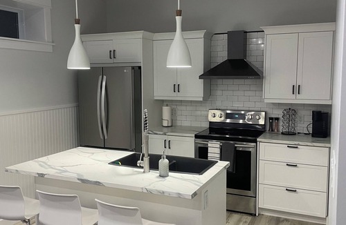 Cherry Brook House | Cozy two-bedroom basement apartment equipped with a full kitchen! (Min 28 days)