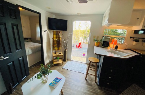 Lepreau House | Cozy waterfront property nestled amongst spruce trees. Pet friendly.