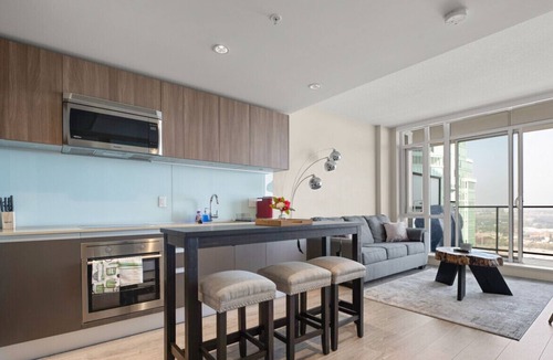 Victoria Park Condo | Downtown 28th FL| Pet Friendly | Heated Parking