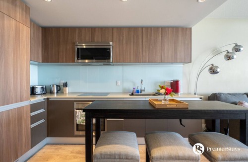 Victoria Park Condo | Downtown 28th FL| Pet Friendly | Heated Parking
