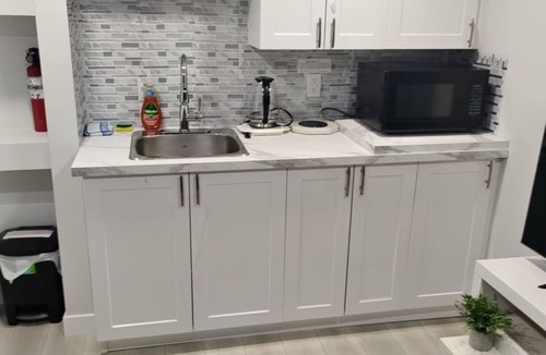 Fort Gary House | Duniques unique home Fully furnished 2 bedroom basement suite