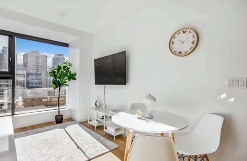 Mount Pleasant Apartment | Elegant Calgary Abode: Fitness Studio, Sauna, Billiards.