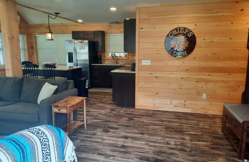 Smithfield Cabin | Enjoy amazing sunsets while steps from North Pond in this cozy 3-bedroom camp.