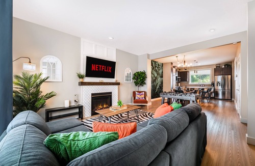 Southeast Edmonton House | Family-Friendly Jungle Themed Home with Hot Tub, AC, and Tree Bunks.