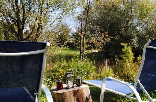 Markdale RV Rental | Glamping Tent at the Koi Pond for a Romantic Getaway, Ontario