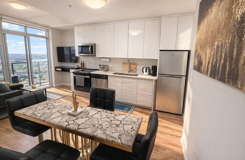 Kitchener Condo | Home In The Clouds | Downtown Retreat | Gym