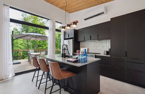 Lac-Superieur Ski Chalet | KALLM Mont-Tremblant luxury chalet with sauna, hot tub, private beach on 8acres