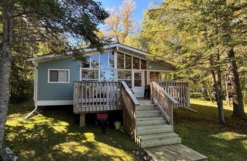 Traverse Bay Cottage | LAKEFORNT-NEW LISTING BY NIRVANA RENTAL AND PROPRTY MANAGEMENT Rent 2 get 2 free
