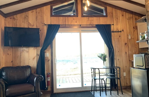 Clare Cabin | Lakefront country cabin with rustic charm overlooking lake