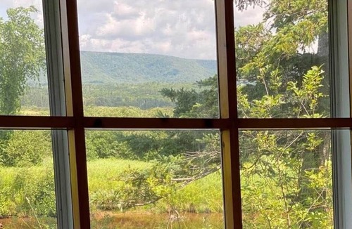Baddeck Bridge Cottage | Large Secluded Riverside Cottage